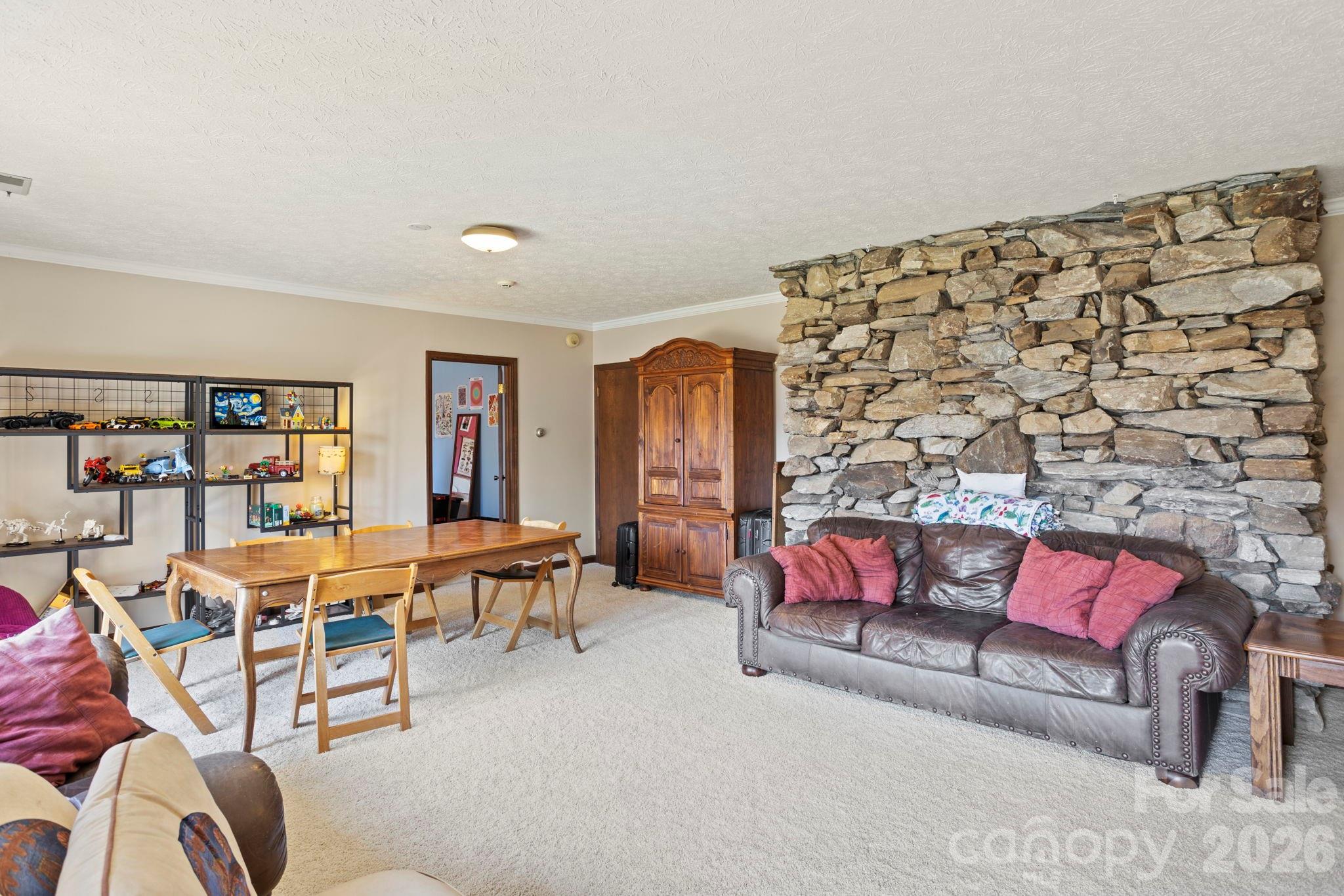 404 Browning Road Hendersonville, NC 28791 - Photo 23 of 46 a living room with furniture and a couch