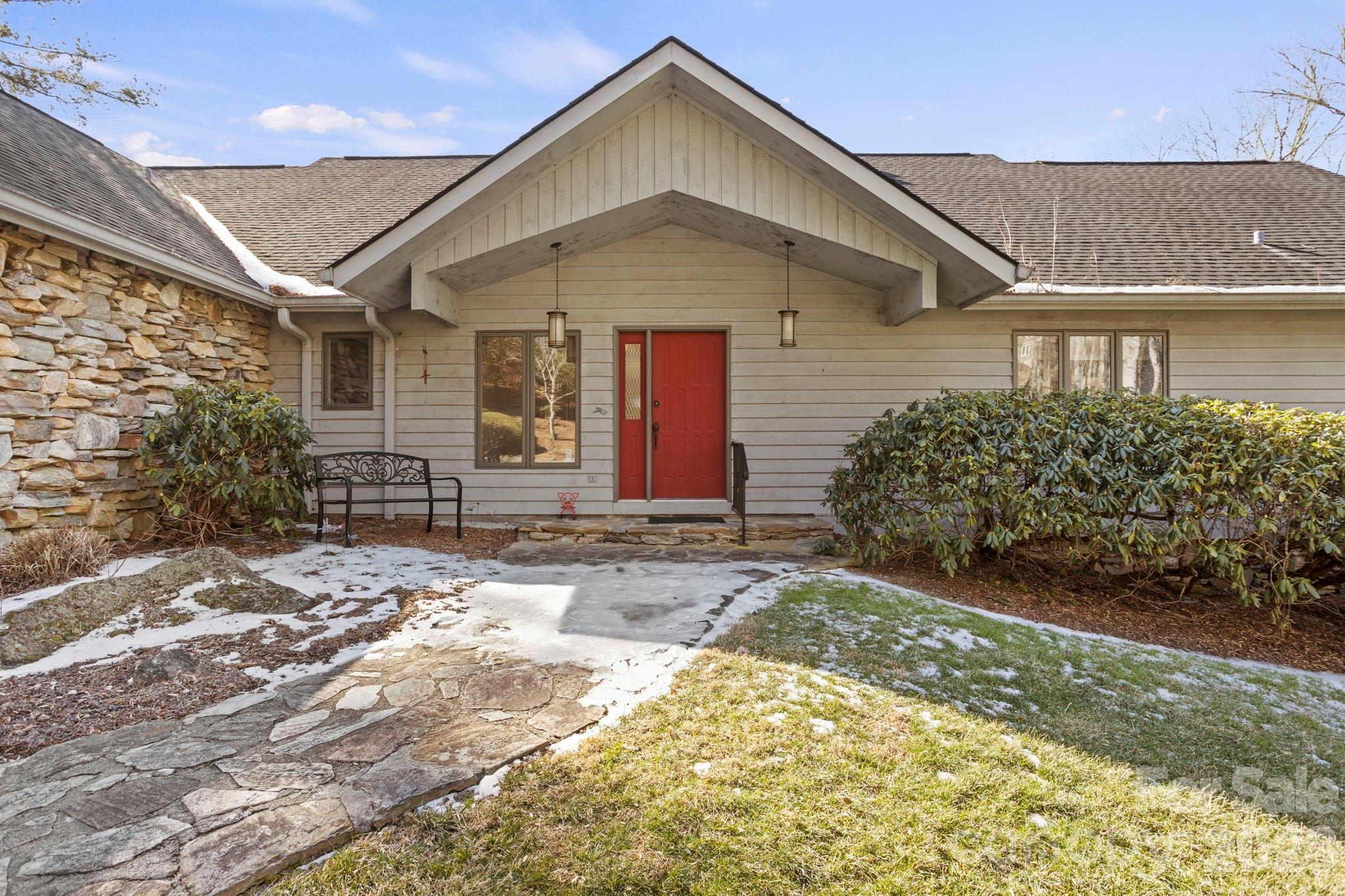 404 Browning Road Hendersonville, NC 28791 - Photo 3 of 46 a front view of a house with a yard
