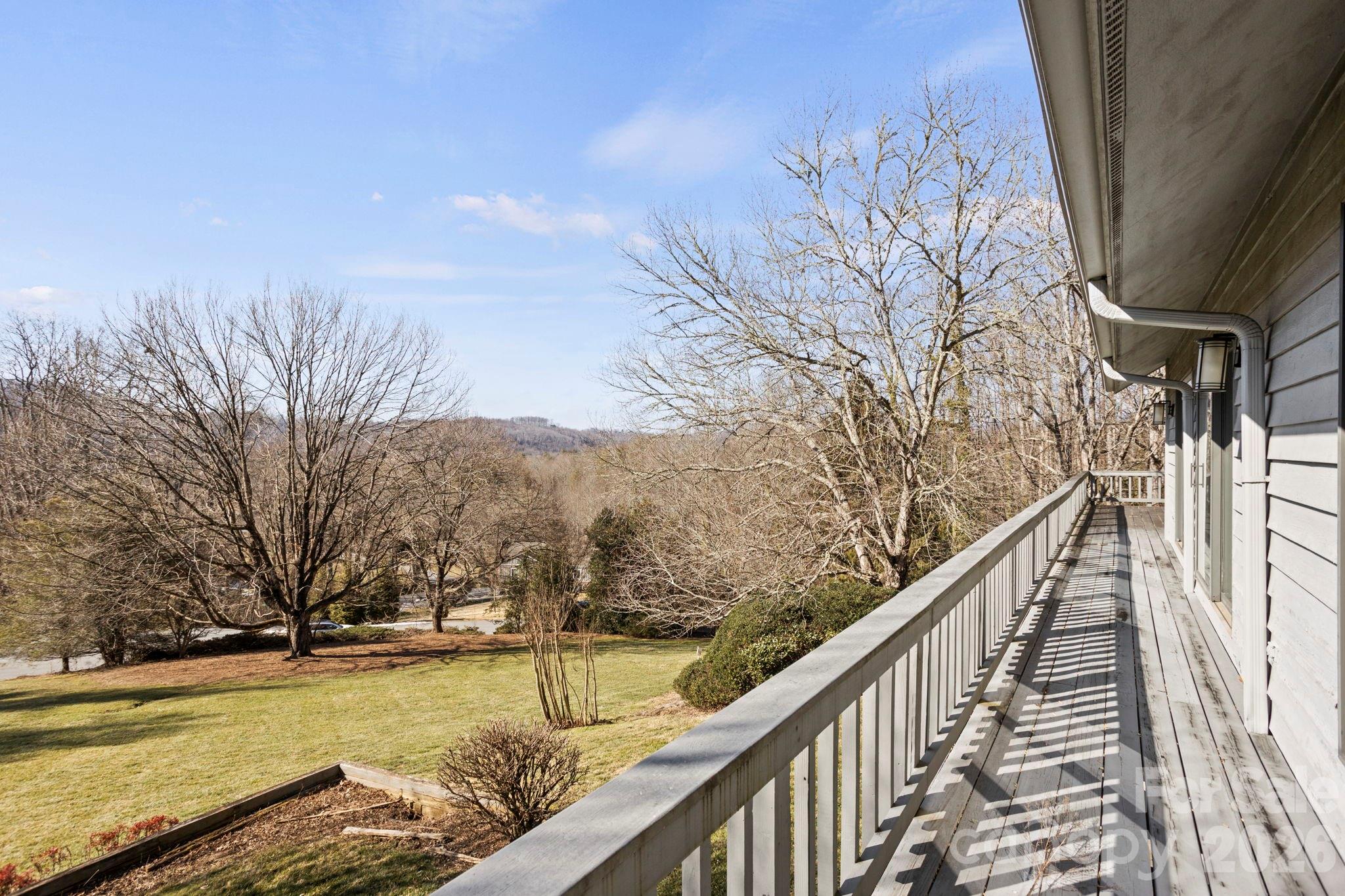 404 Browning Road Hendersonville, NC 28791 - Photo 35 of 46 a view of a swimming pool with a patio and a yard