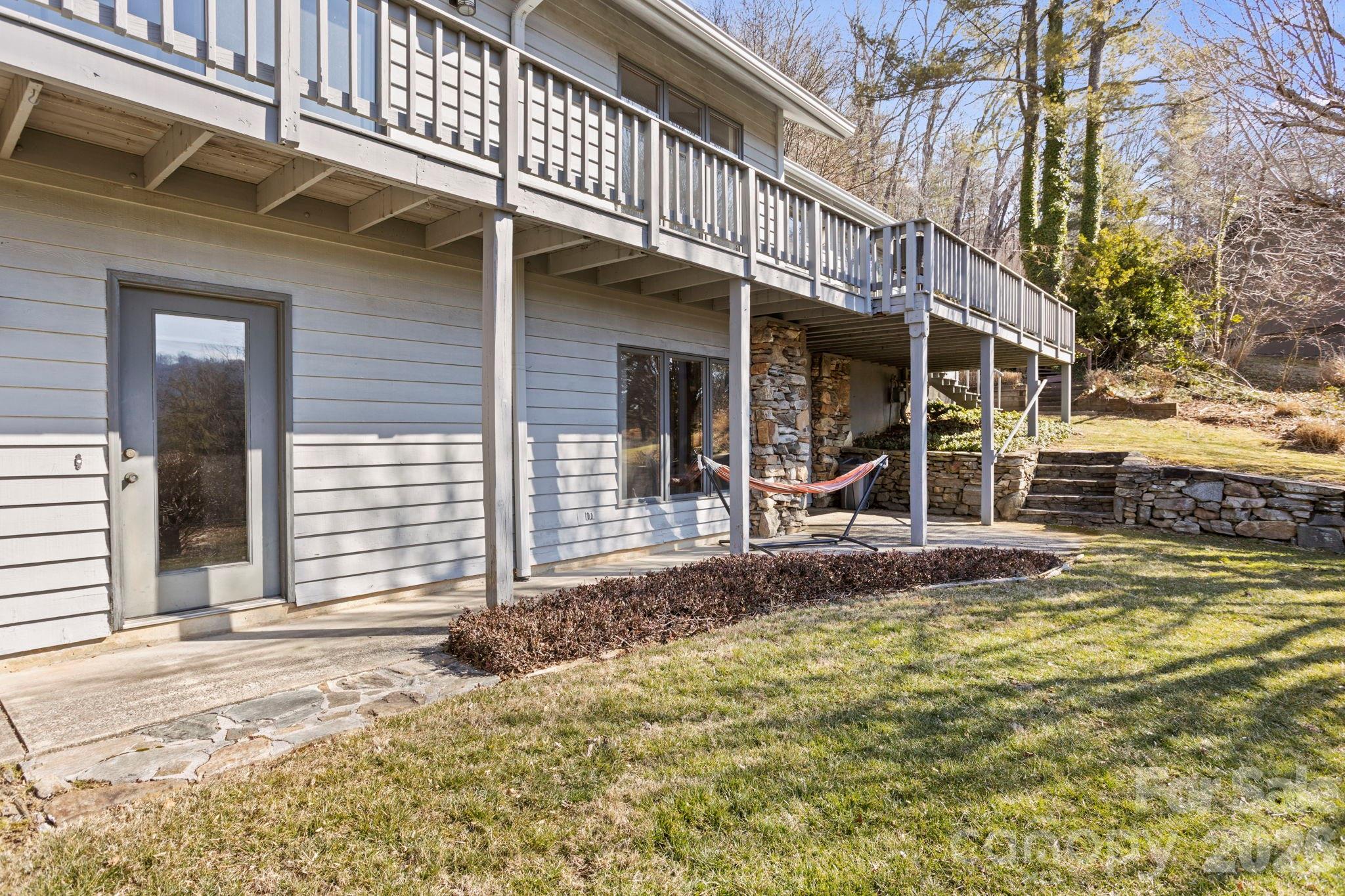 404 Browning Road Hendersonville, NC 28791 - Photo 37 of 46 a view of a house with a porch