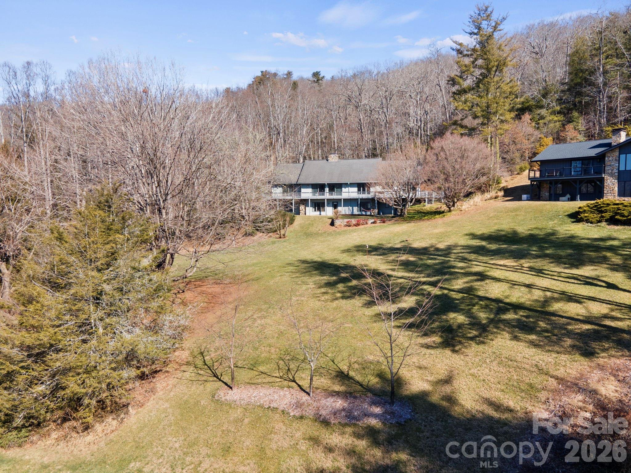 404 Browning Road Hendersonville, NC 28791 - Photo 40 of 46 a view of residential houses with yard and mountain view