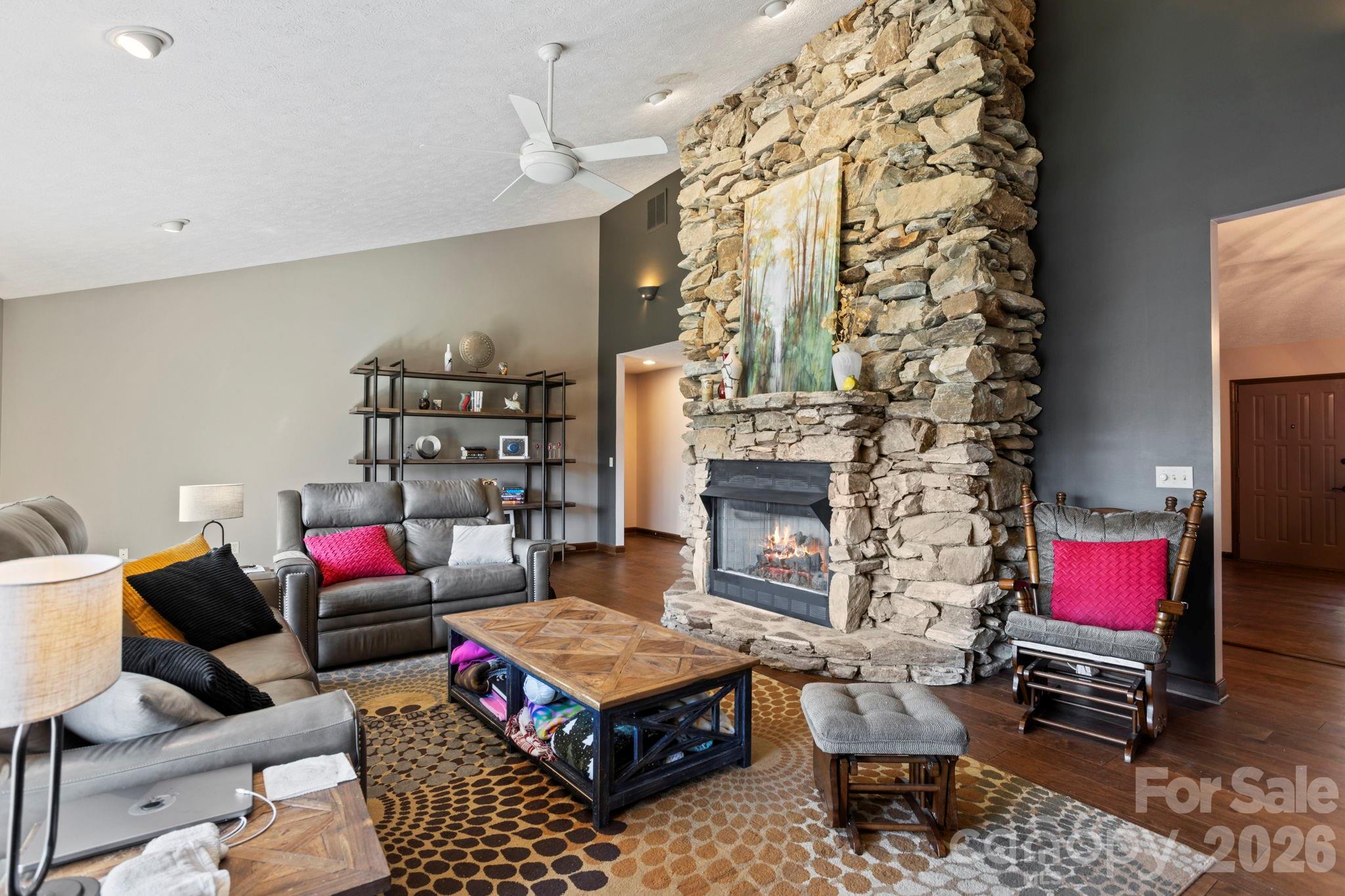 404 Browning Road Hendersonville, NC 28791 - Photo 7 of 46 a living room with furniture and a fireplace