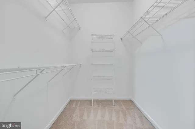 a view of a room with racks on the wall