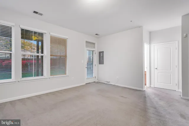 an empty room with windows