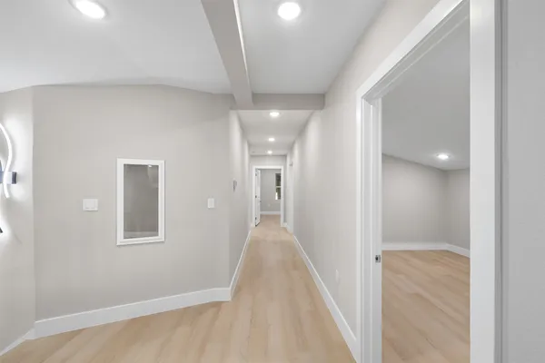a view of a walk in closet and bedroom