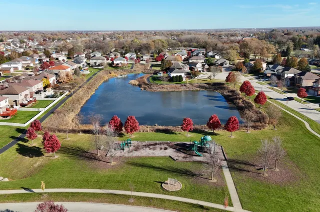 an aerial view of a houses with outdoor space
