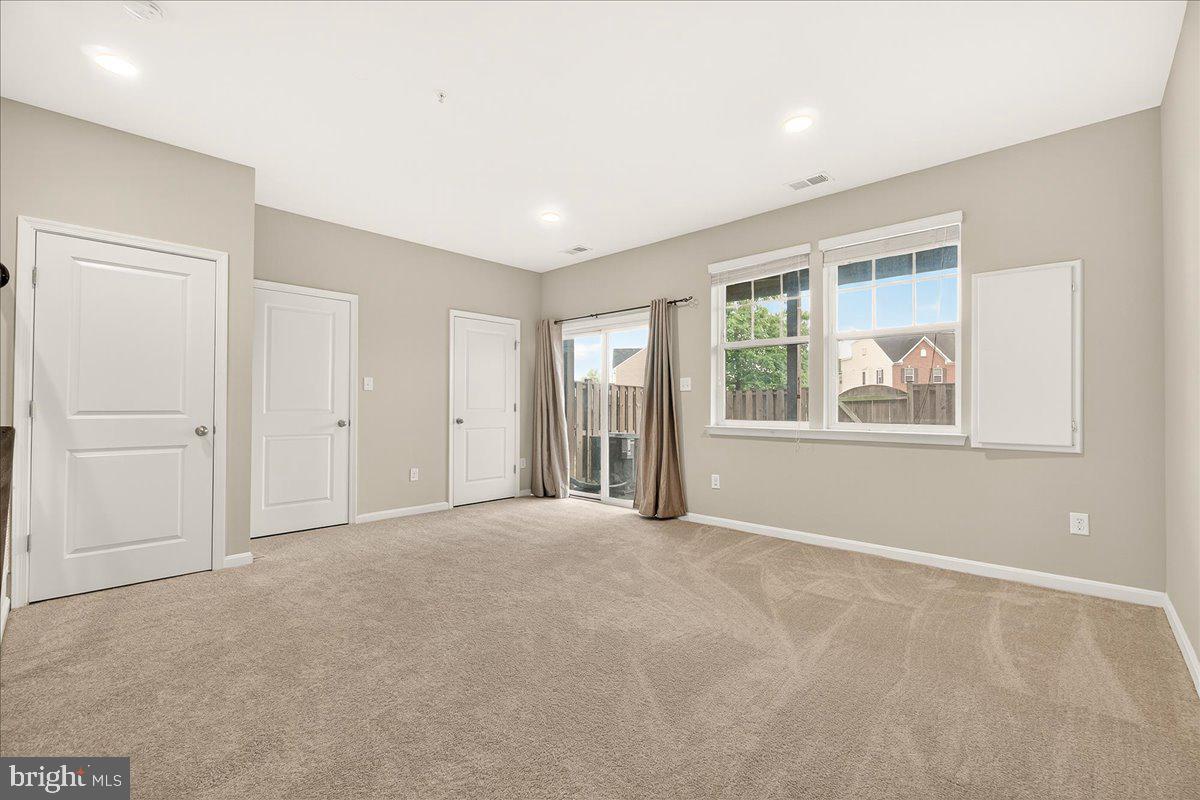 4654 Cambria Road Frederick, MD 21703 - Photo 11 of 55 a view of an empty room with a window