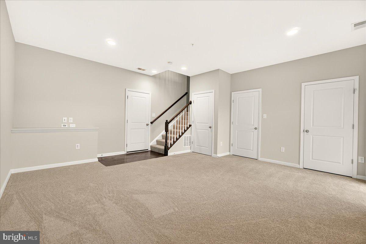 4654 Cambria Road Frederick, MD 21703 - Photo 13 of 55 a view of an empty room with stairs