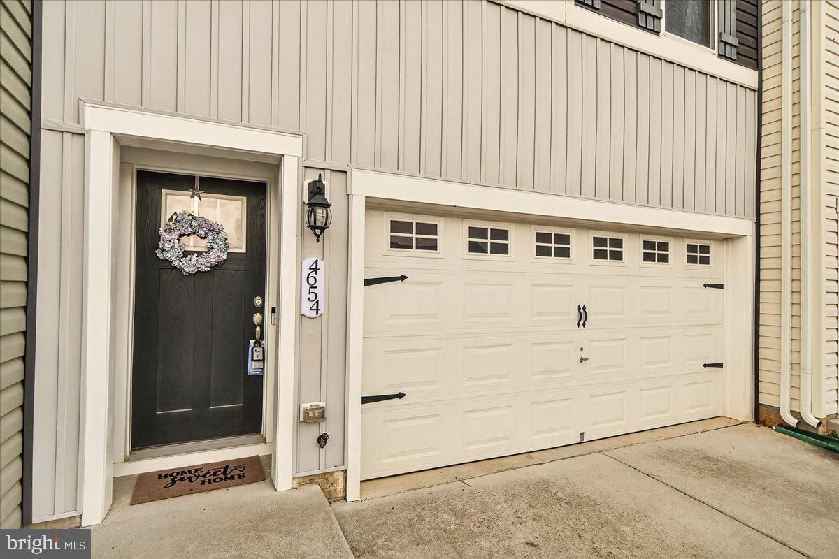 4654 Cambria Road Frederick, MD 21703 - Photo 3 of 55 a view of a front door of the house