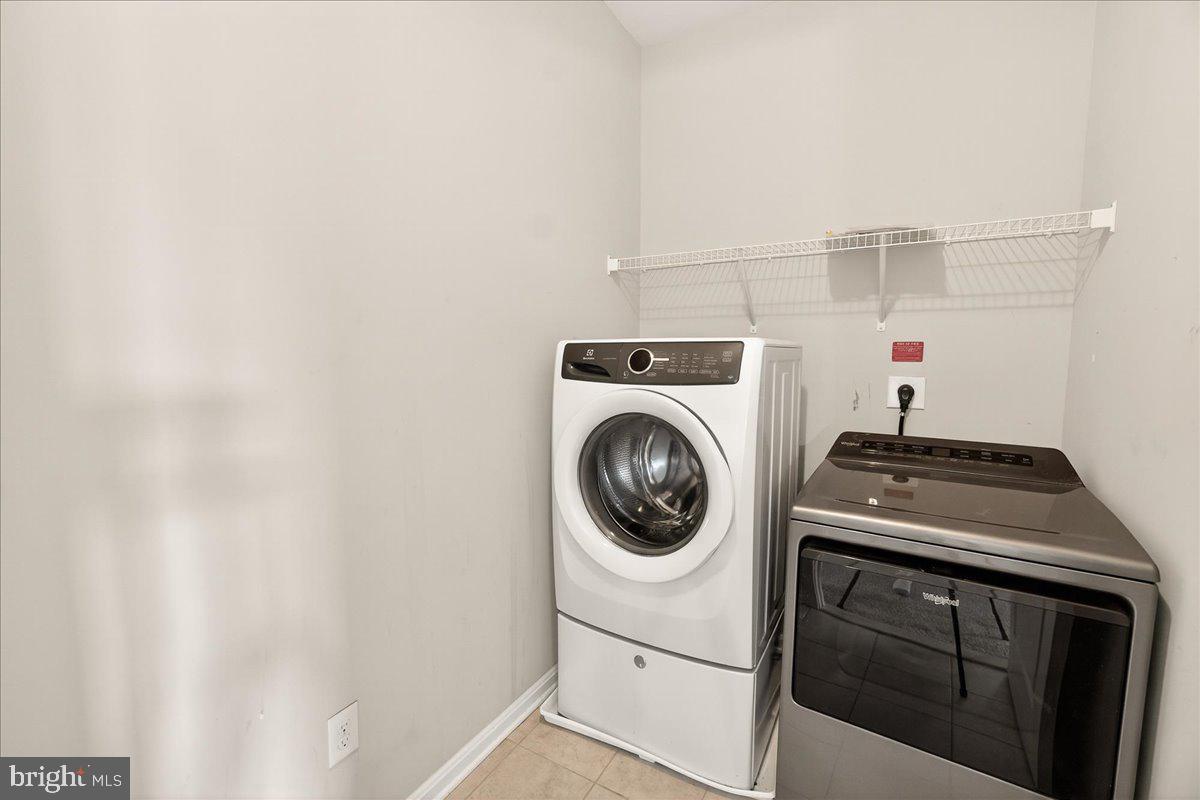 4654 Cambria Road Frederick, MD 21703 - Photo 31 of 55 a utility room with dryer and washer