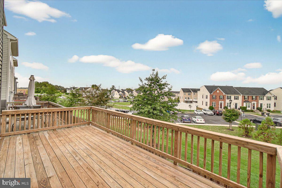 4654 Cambria Road Frederick, MD 21703 - Photo 36 of 55 a view of a balcony with wooden floor