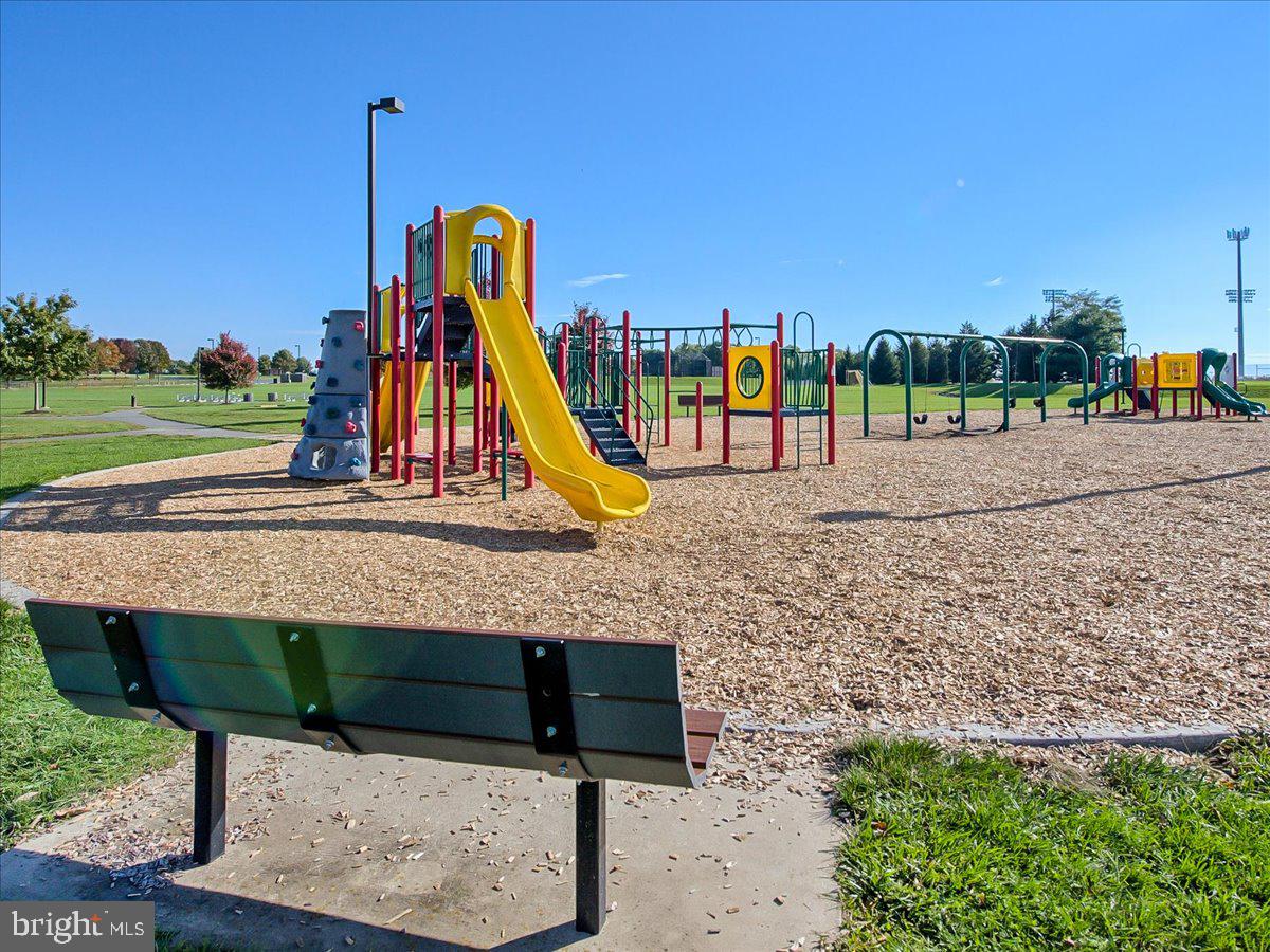4654 Cambria Road Frederick, MD 21703 - Photo 43 of 55 a view of a park with slide and potted plants