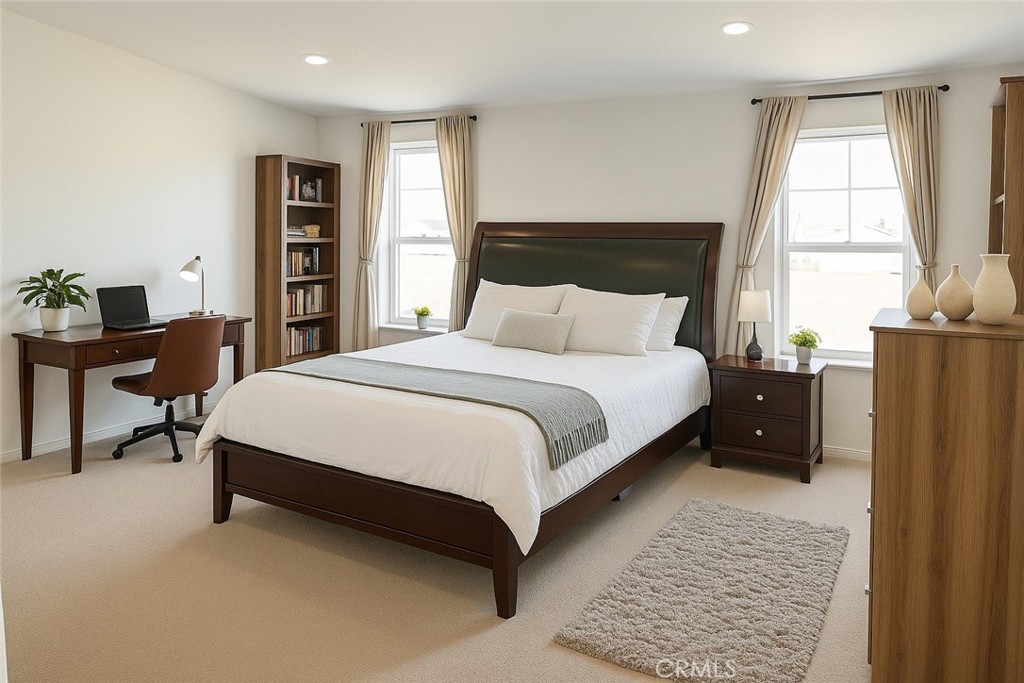 9235 Lindero Road Victorville, CA 92392 - Photo 3 of 11 a bedroom with a bed a table and a window