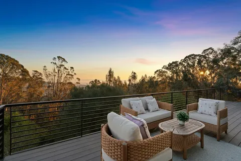 a bedroom with a large bed and a large window