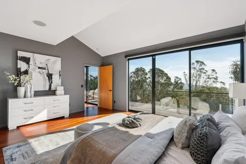 a bathroom with a shower sink and mirror