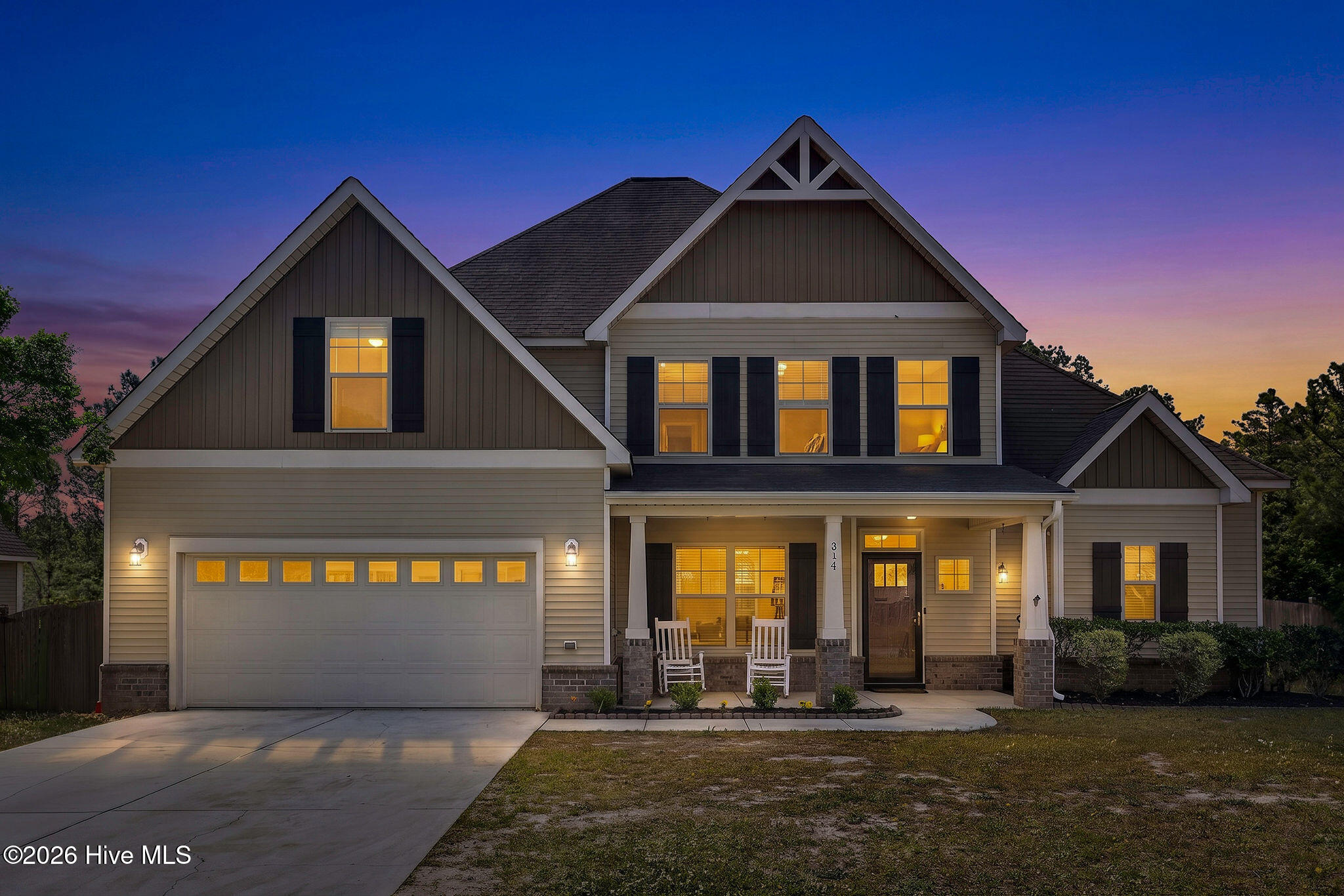314 Plymouth Lane Holly Ridge, NC 28445 - Photo 1 of 46 314PlymouthLane-2_Dusk