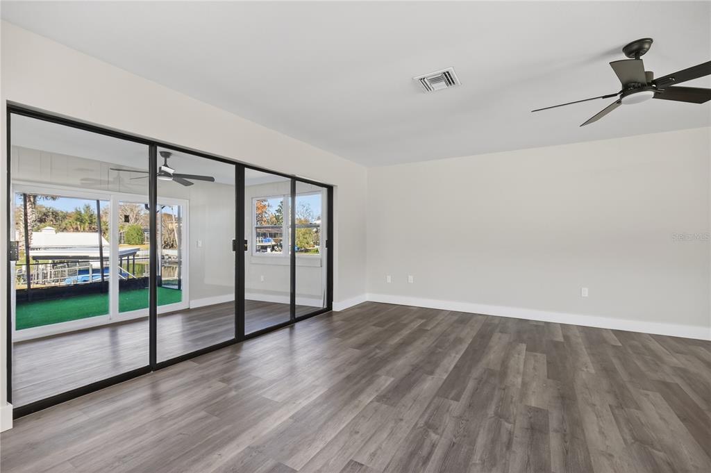 1503 Canal Court Tavares, FL 32778 - Photo 17 of 41 a view of entryway with wooden floor