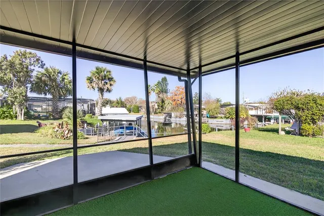 a bathroom with a sink and a large window