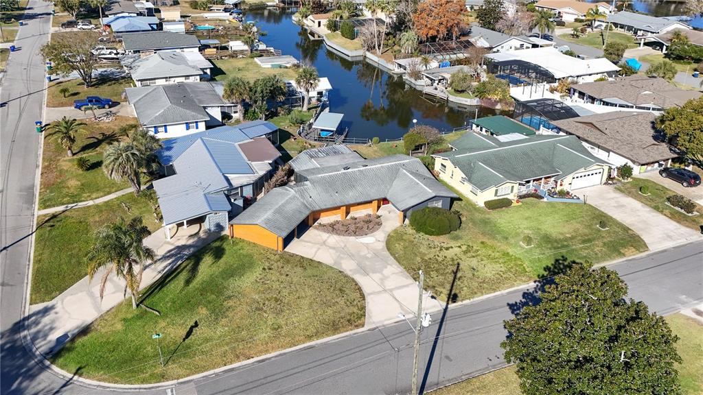 1503 Canal Court Tavares, FL 32778 - Photo 33 of 41 an aerial view of residential houses with outdoor space