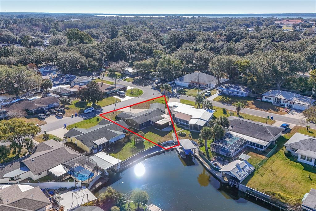 1503 Canal Court Tavares, FL 32778 - Photo 37 of 41 an aerial view of residential houses with outdoor space