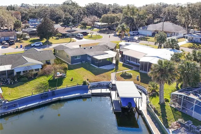 a view of a house with swimming pool