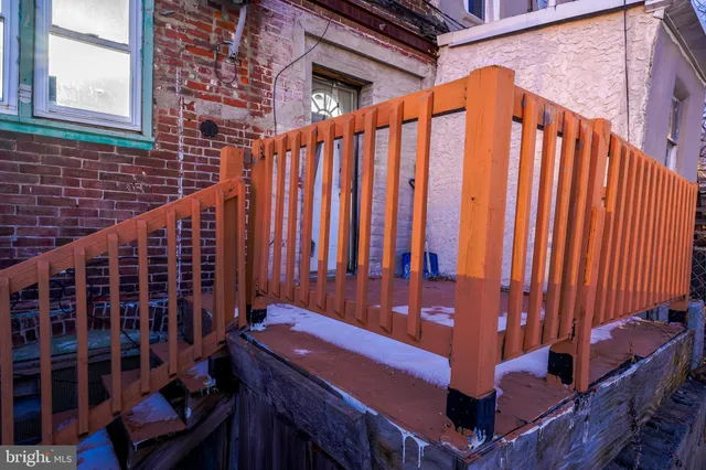 a view of outdoor space with deck and furniture