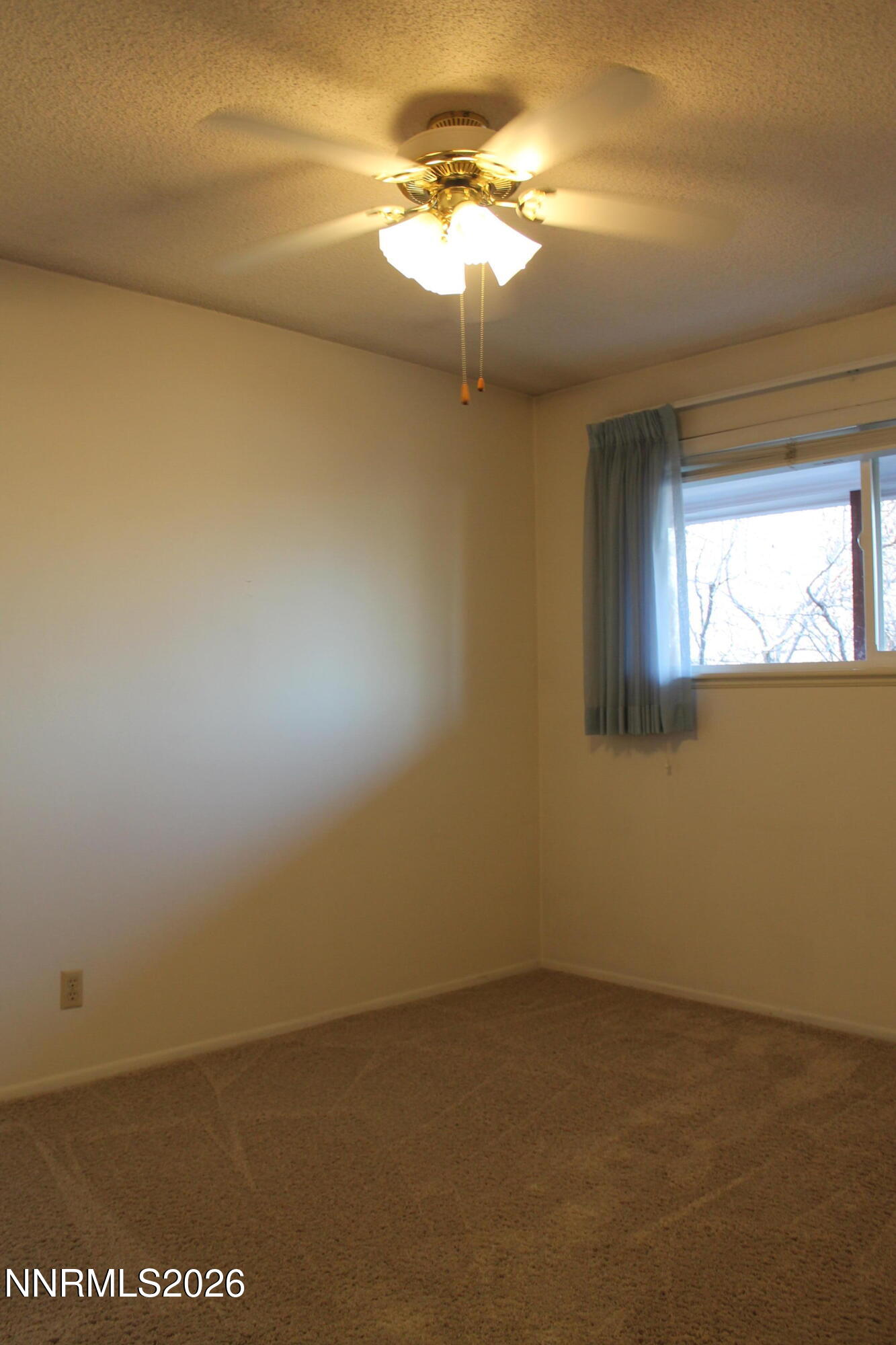1940 4th Street, Unit 46 Sparks, NV 89431 - Photo 18 of 21 a view of a room with a fan
