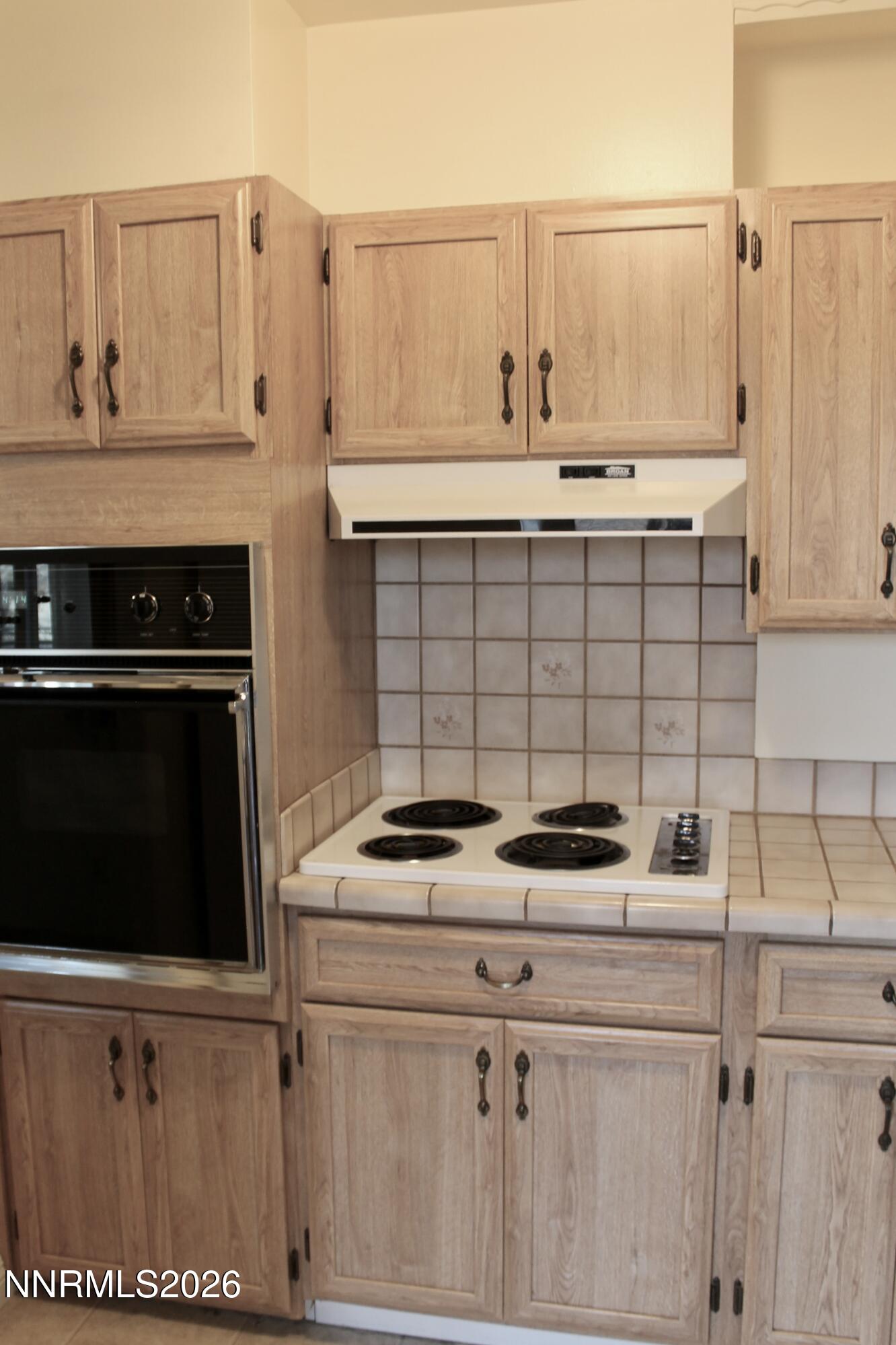 1940 4th Street, Unit 46 Sparks, NV 89431 - Photo 9 of 21 a kitchen with cabinets and appliances