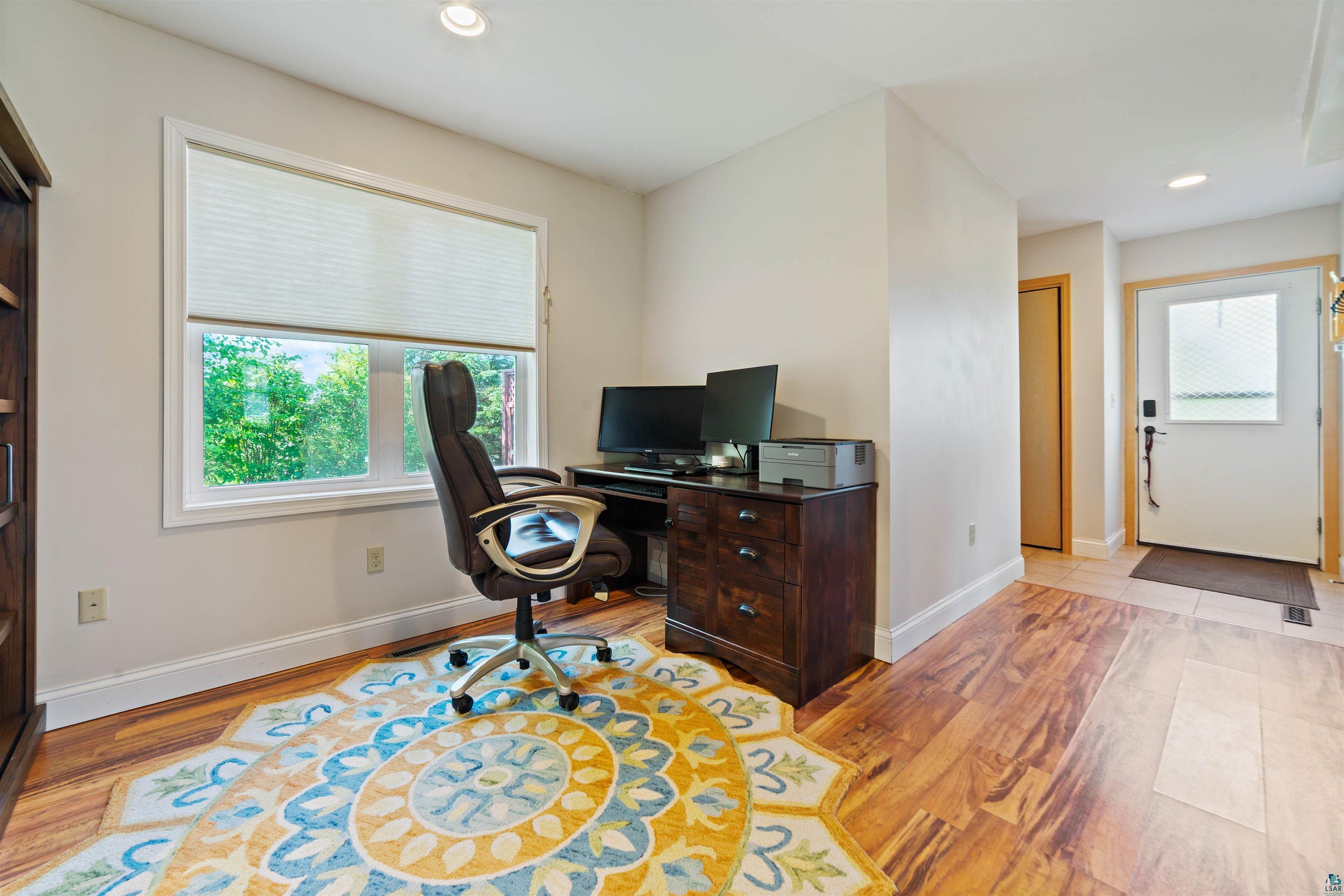 4073 Reinke Road Duluth, MN 55811 - Photo 20 of 32 Bright room with wood-finish flooring and a large window