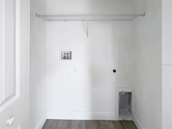 a view of small space with racks on the wall