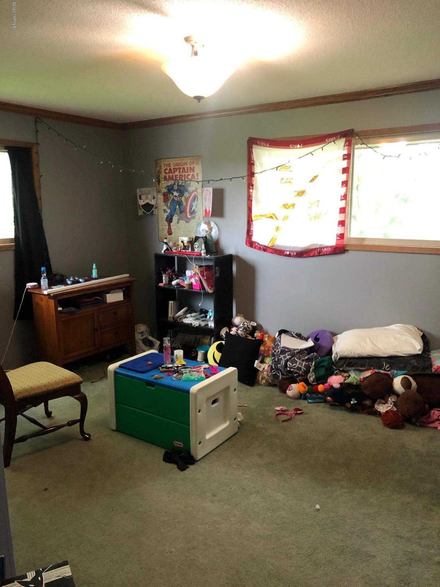 170 St Mary Road Harrah, WA 98933 - Photo 15 of 26 a room with furniture and window