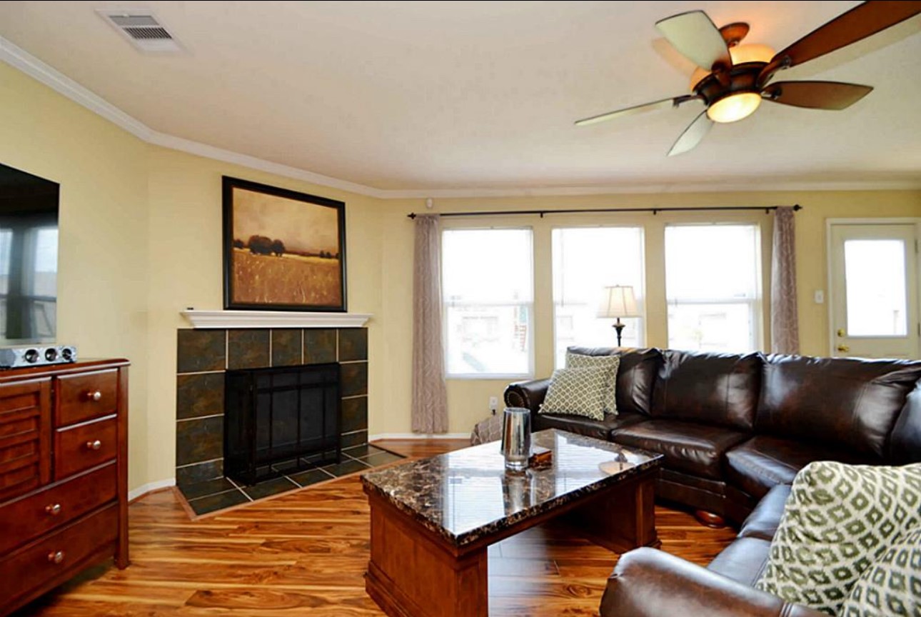 20606 Ricewood Village Trail Katy, TX 77449 - Photo 5 of 17 a living room with furniture fireplace and window