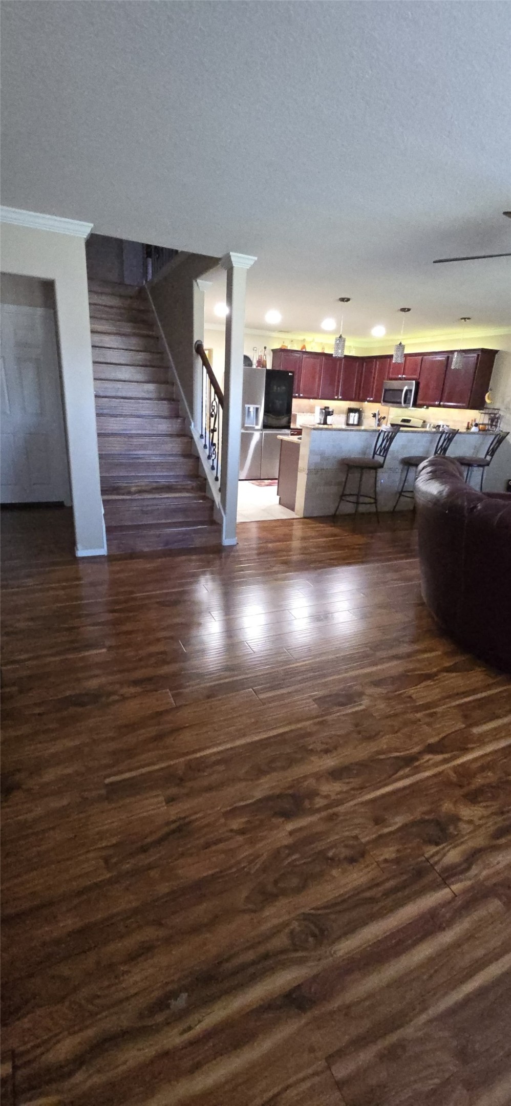20606 Ricewood Village Trail Katy, TX 77449 - Photo 7 of 17 a view of a room with wooden floor