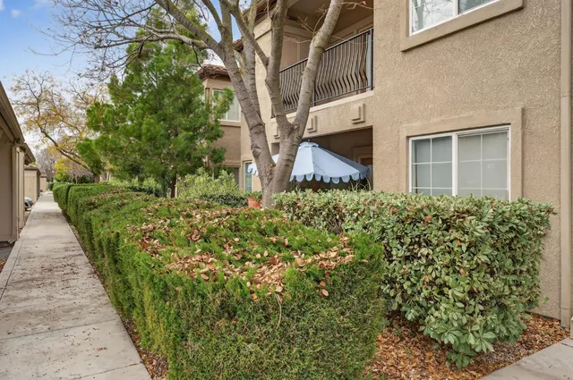 a backyard of a house with lots of green space