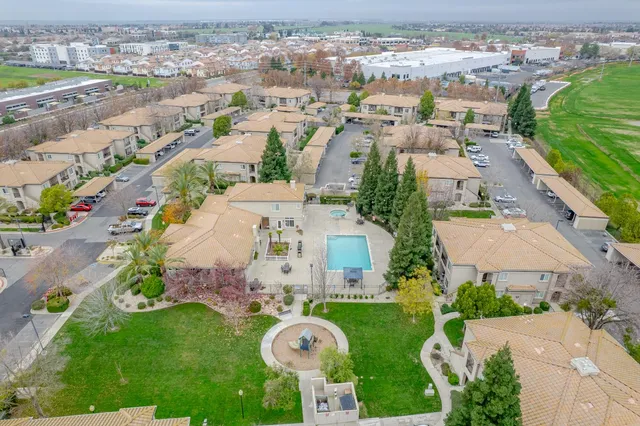 an aerial view of a house with a garden
