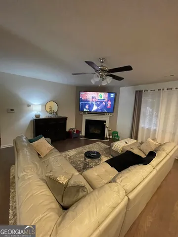 a bedroom with a bed and a fireplace