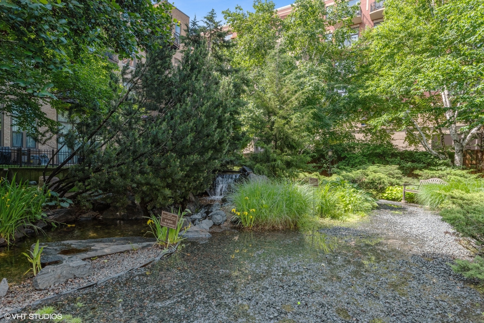 1301 West Madison Street, Unit 603 Chicago, IL 60607 - Photo 23 of 24 a backyard of a house with a yard and outdoor seating