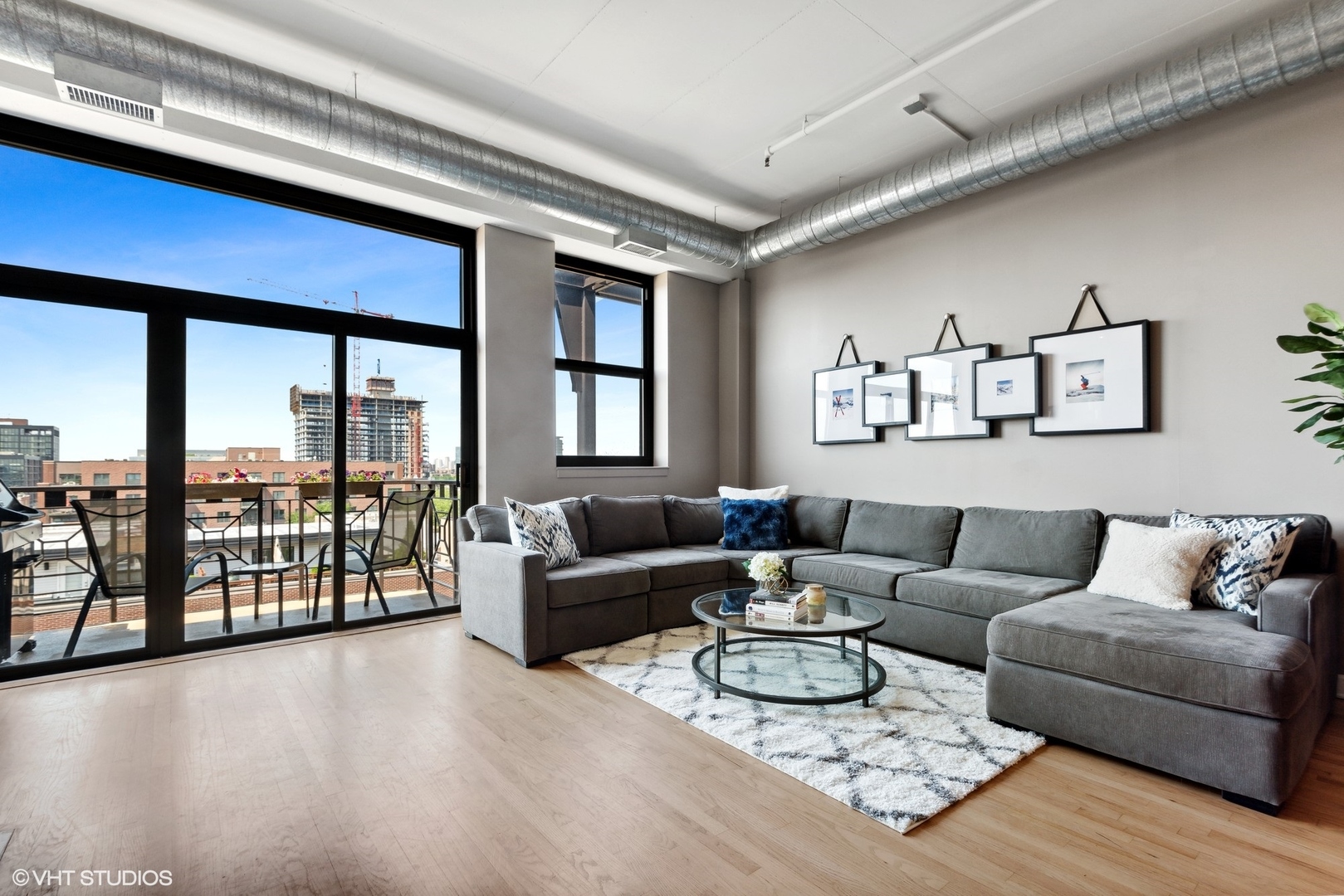 1301 West Madison Street, Unit 603 Chicago, IL 60607 - Photo 4 of 24 a living room with furniture and a large window
