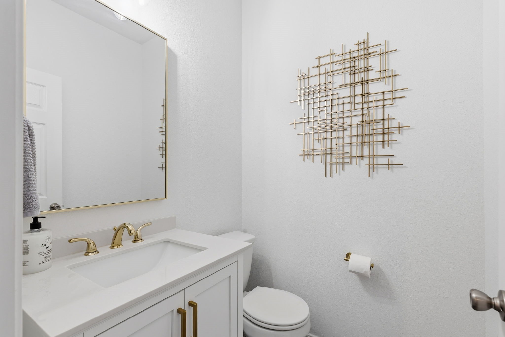 5127 Avondale Rise Street Katy, TX 77493 - Photo 19 of 47 a bathroom with a sink toilet and a mirror