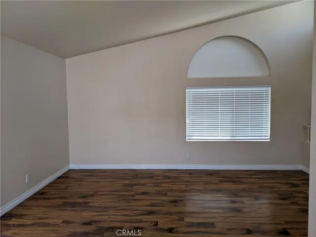 a kitchen with granite countertop a stove and a sink