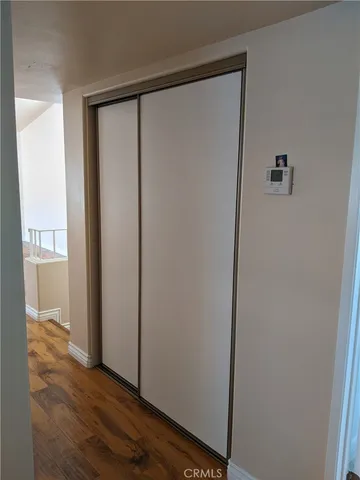 a bathroom with a granite countertop toilet sink and shower