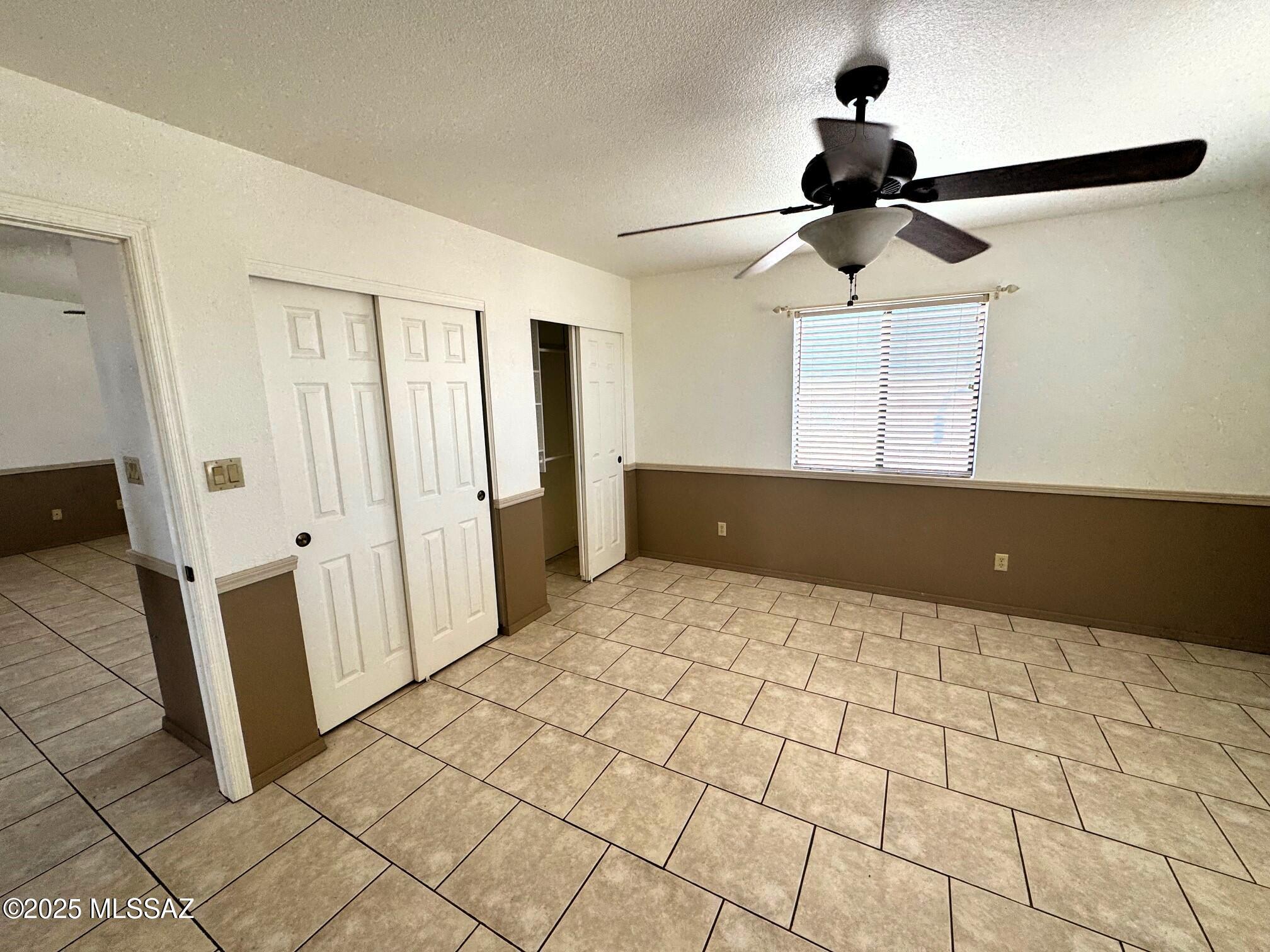 13384 South Cottonwood Road Pearce, AZ 85625 - Photo 16 of 46 a view of an empty room and window