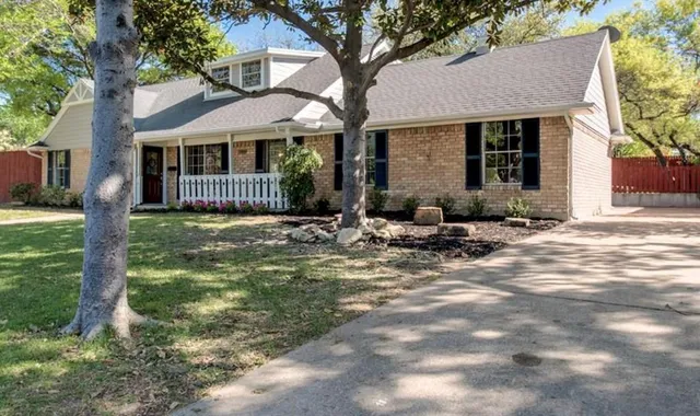 a view of a living room and dining room