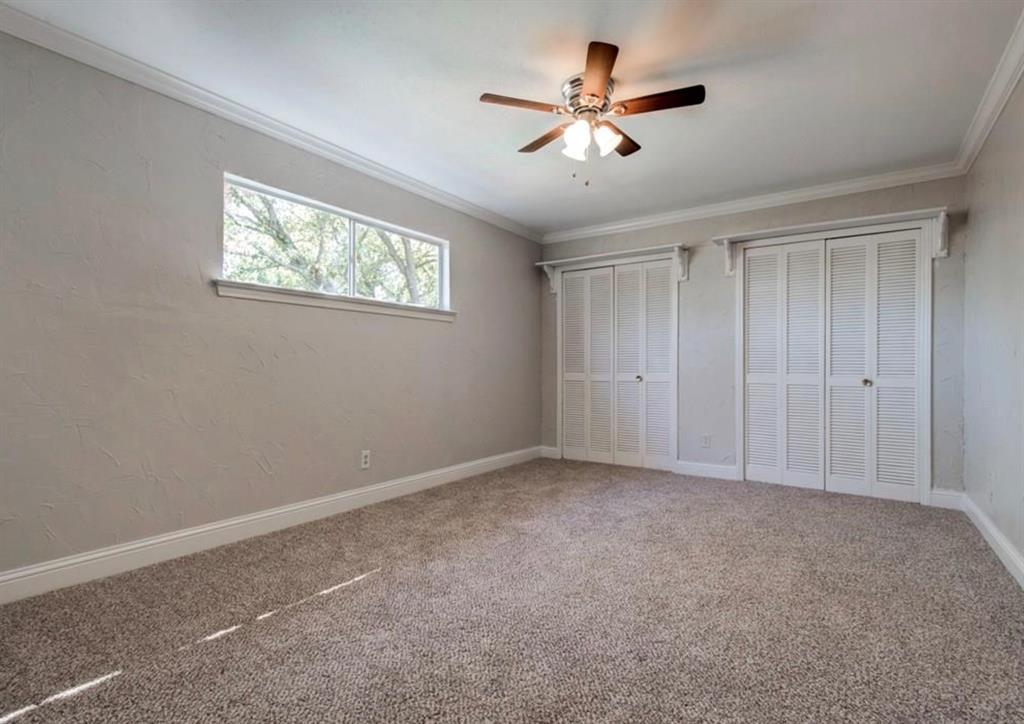 2888 Reedcroft Drive Farmers Branch, TX 75234 - Photo 17 of 32 a view of an empty room with a window