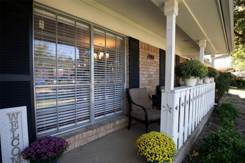 2888 Reedcroft Drive Farmers Branch, TX 75234 - Photo 8 of 32 a view of a chair and table in the balcony
