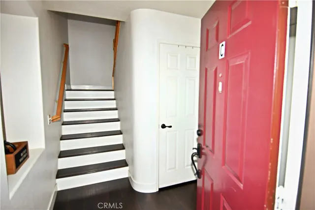 a view of a hallway with front door