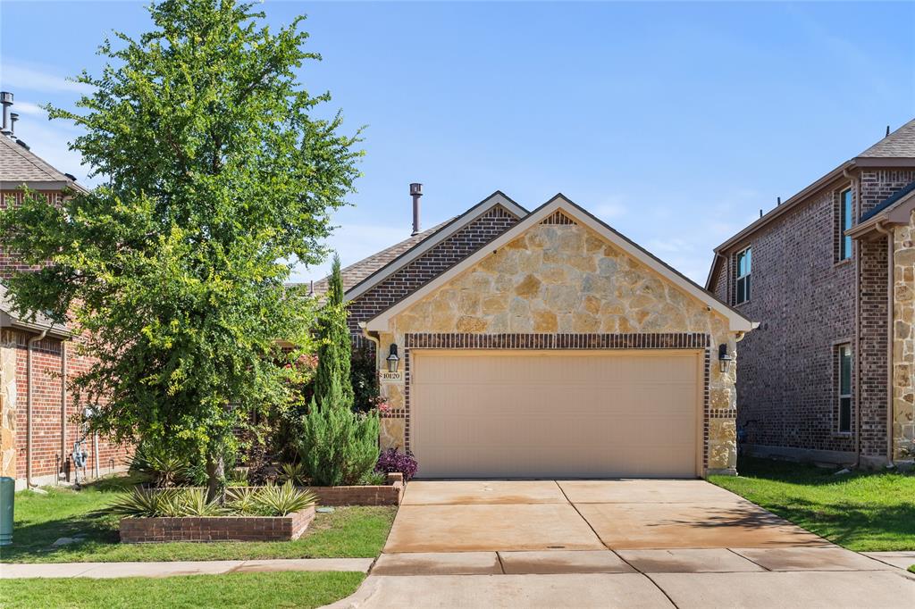 10120 Houston Way McKinney, TX 75071 - Photo 1 of 1 a view of garage yard and tree