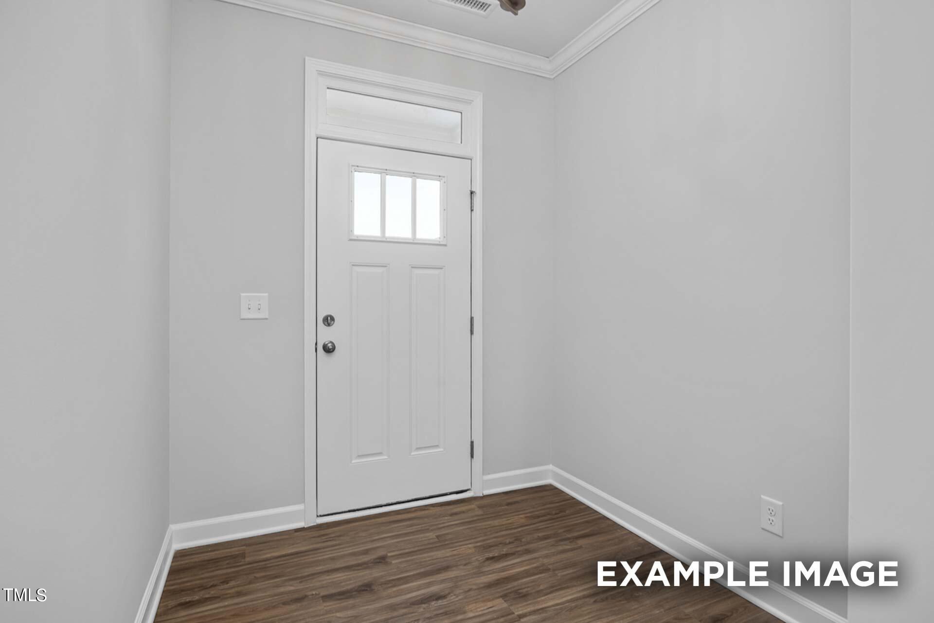 802 Rollingwheel Road Mebane, NC 27302 - Photo 2 of 40 a view of an empty room and window