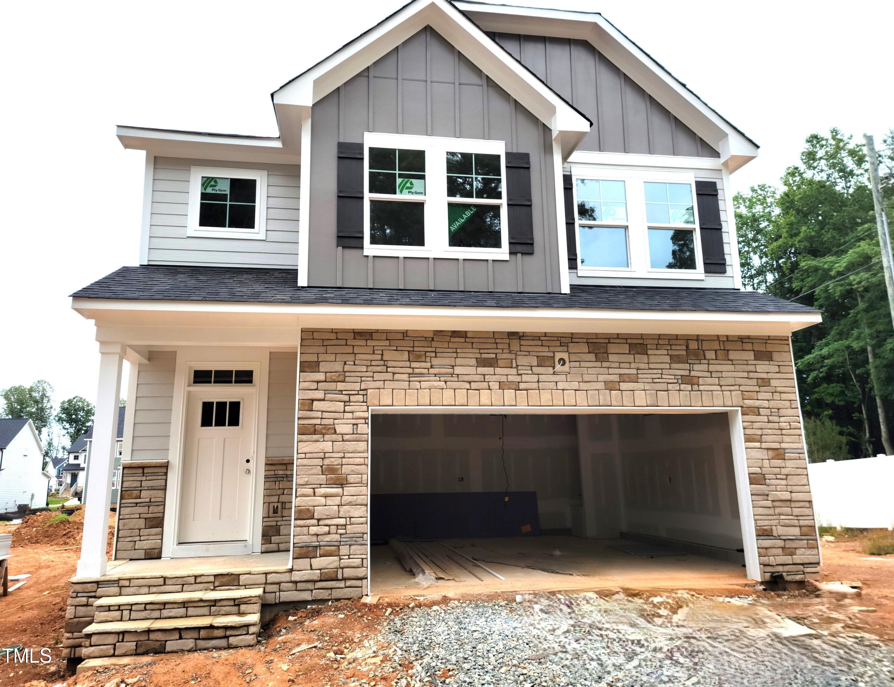 802 Rollingwheel Road Mebane, NC 27302 - Photo 28 of 40 a front view of a house with a balcony