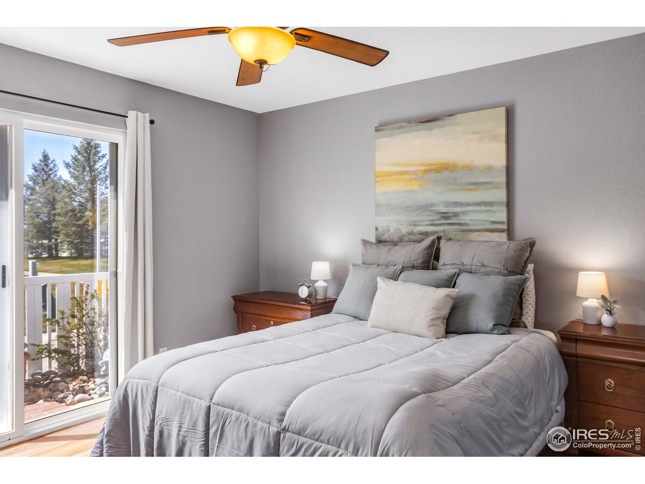 11737 Zenobia Loop Westminster, CO 80031 - Photo 20 of 39 a bedroom with a bed and a window